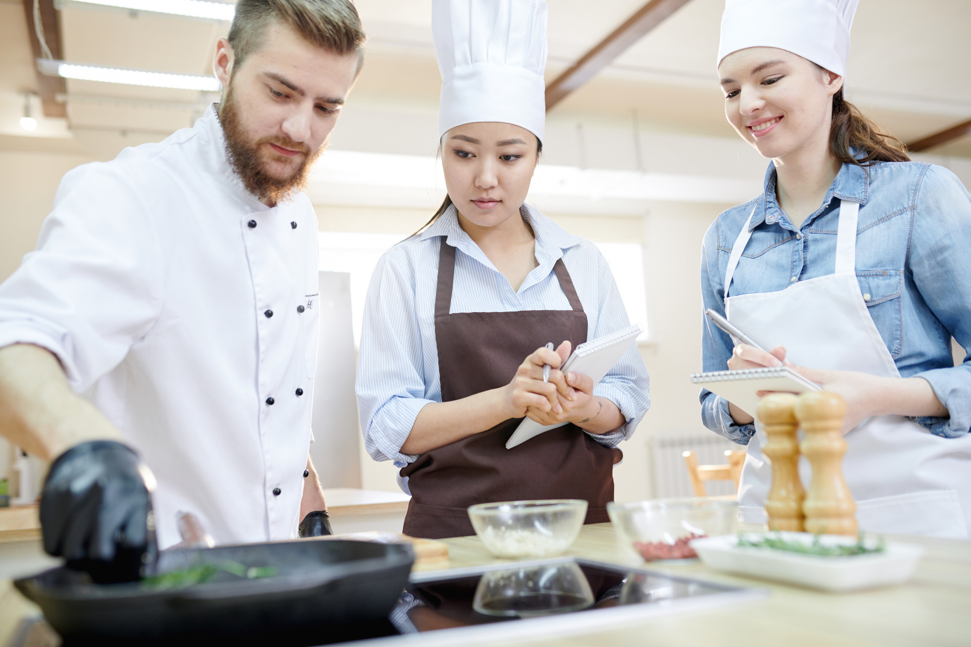 Group workshop scene with chef guiding participants