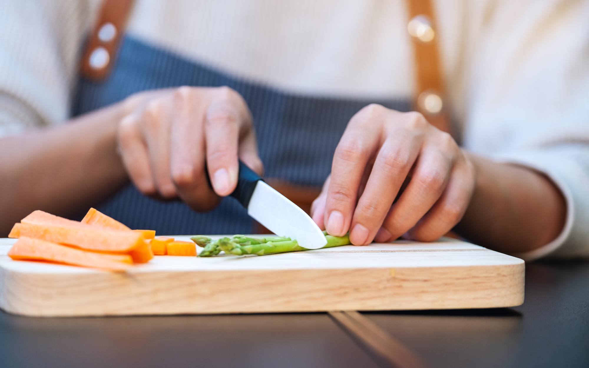Participant slicing vegetables